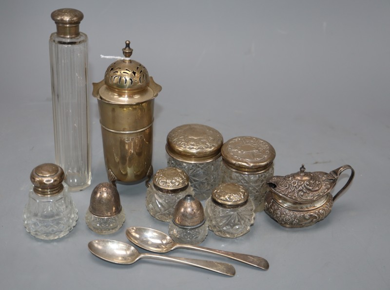 A George V silver muffineer, 15.5cm, a late Victorian embossed silver mustard pot and ten other silver items,